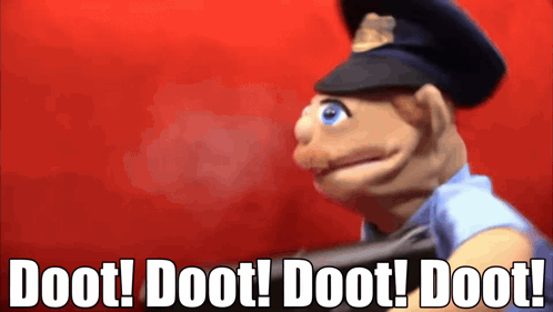 Puppet Holding Gun Saying Doot Doot Doot