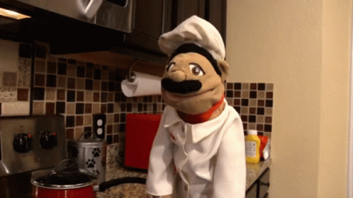 Puppet in Chef Uniform in Kitchen