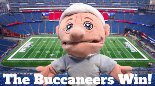 Puppet In Front Of Football Field Saying The Buccaneers Win GIF