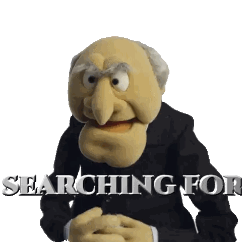 Puppet in Suit Saying Searching