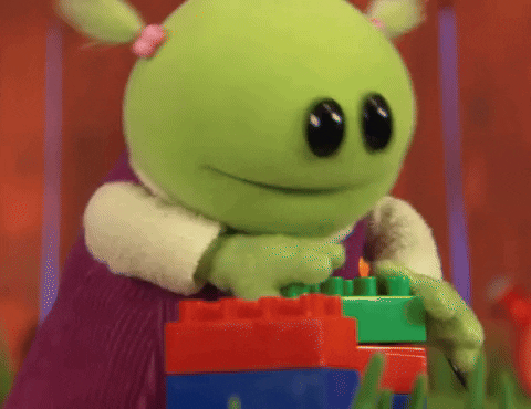 Puppet Playing Lego GIF