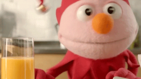 Puppet Shaking Drinking Orange Juice GIF