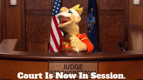 Puppet Sitting at Judge Bench Court Is Now in Session