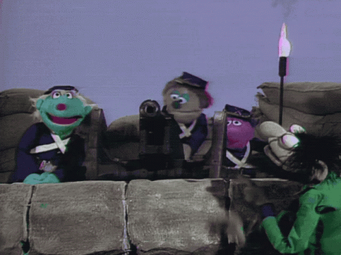 Puppet Soldiers Sitting On Wall GIF