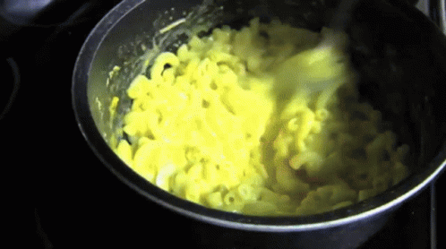 Puppet Stirring Mac N Cheese GIF