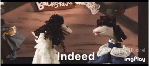 Puppets Standing Next to Each Other