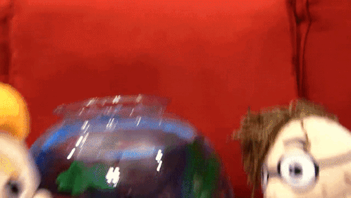 Puppets With A Bowl Of Goldfish GIF