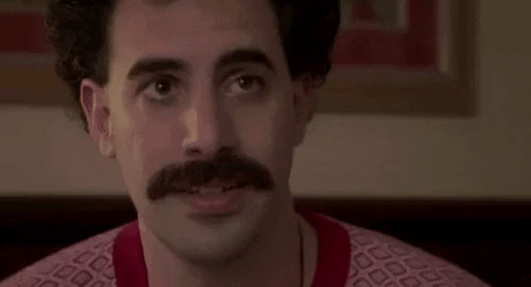 Puppy Dog Eyes Sacha Baron Cohen GIF