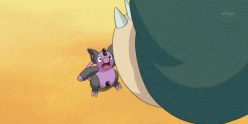 Purple and Black Cartoon Next to Large Character Tokyo