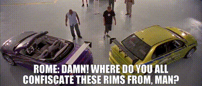 Purple Car and Yellow Car in Garage