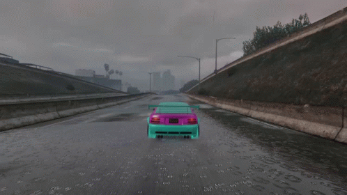 Purple Car Driving Down Rainy Highway