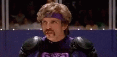 Purple Costumed Man With Mustache Before Crowd GIF