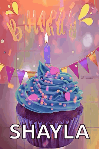 Purple Cupcake with Blue Frosting and Lit Candle Shayla
