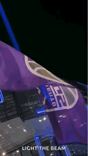 Purple Flag Saying Light The Beam GIF