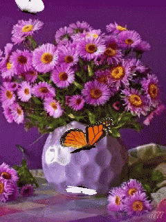 Purple Flowers In A Vase With A Butterfly GIF