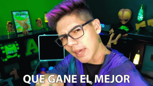 Purple-Haired Man Glasses Says Que Gane El Mejor