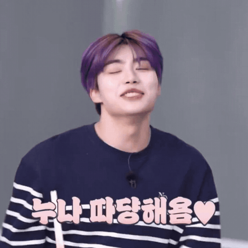 Purple-Haired Man in Striped Shirt with Korean Writing