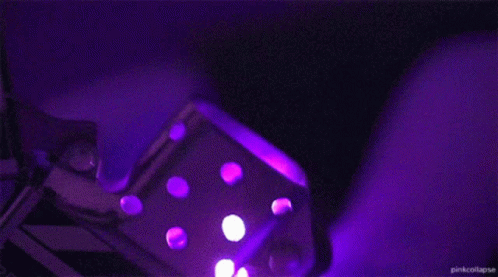 Purple Lighter with Sparks in Dark