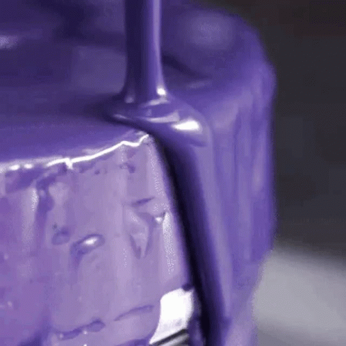 Purple Paint Poured On Metal GIF