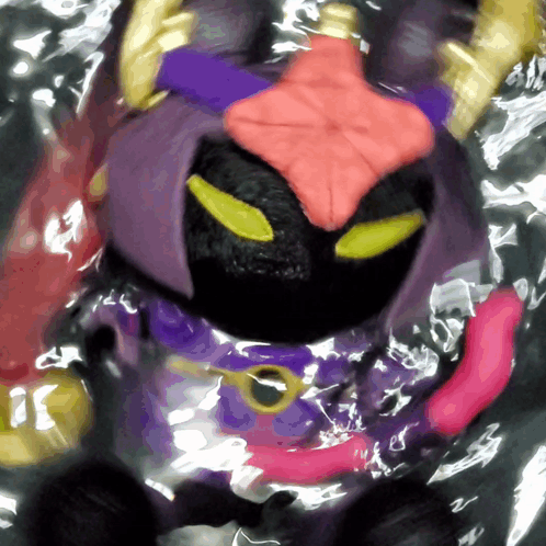 Purple Pink Toy with Yellow Eyes and Sword