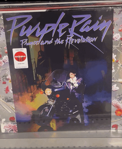 Purple Rain Prince And The Revolution Album Cover With A Motorcycle On It GIF