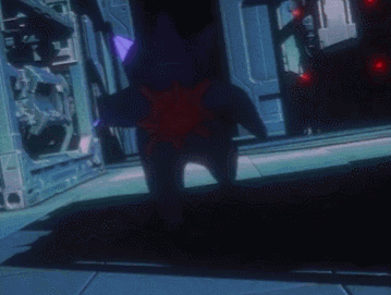 Purple Robot With Red Star on Back in Dark Room