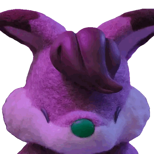 Purple Stuffed Animal with Green Nose and Ears