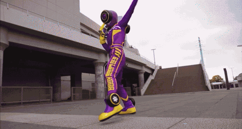 Purple Yellow Costume Saying I Feel Like A Robot GIF