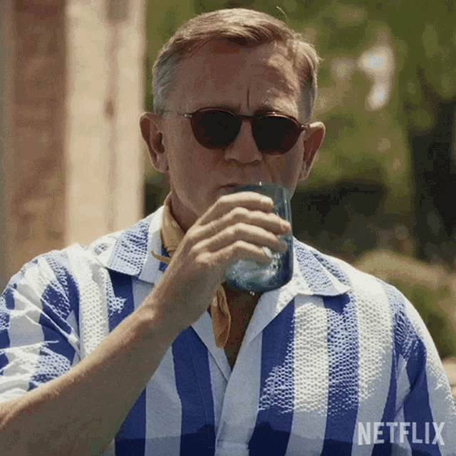 Putting Down Drink Benoit Blanc Gif GIF