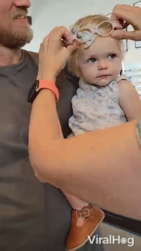 Putting On Glasses Cute Baby Girl GIF