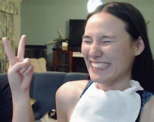 Putting On Whipped Cream On Woman's Face GIF