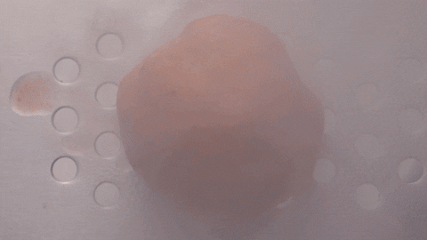 Putting Seasonings On Meatball GIF