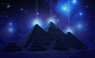 Pyramids Lit Up at Night Starry Sky