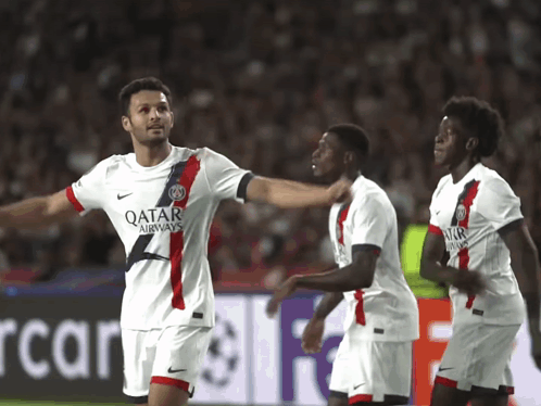 Qatar Airways Soccer Player Celebrates with Teammates