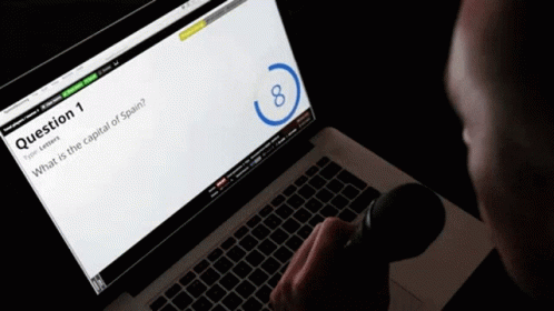 Quiz Host Reading Questions Laptop GIF