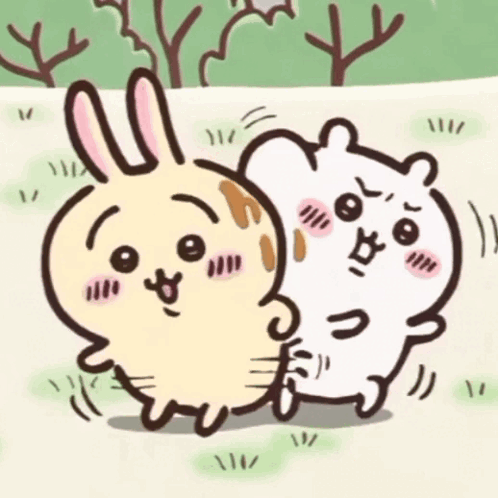 Rabbit and Mouse Standing in Grass