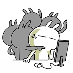 Rabbit Sitting in Front of Computer