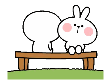 Rabbits Sitting On Bench