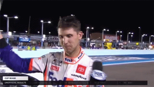 Race Car Driver In FedEx Jersey Holding Up Hand GIF
