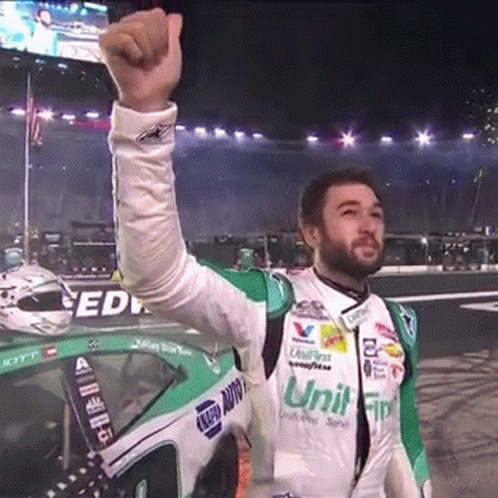 Race Car Driver in Unit FIP Jacket Fists