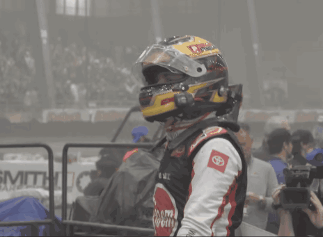 Race Car Driver Wearing Reem Jersey
