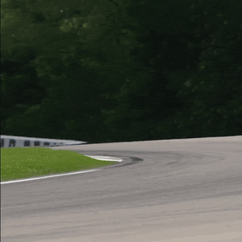 Race Car Going Around Curve GIF