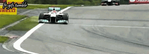 Race Car Going Around Curve f1-gifs.tumblr