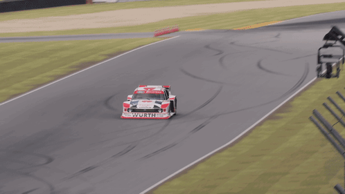 Race Car on Curve with 30 Sign