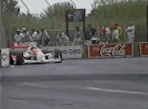 Race Car On Track With Coca Cola Sign GIF
