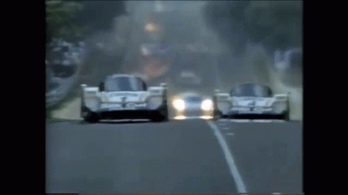 Race Car With Number 7 Driving GIF