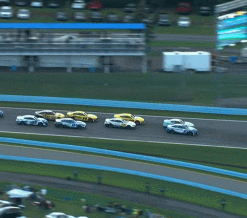 Race Cars Lined Up on Track