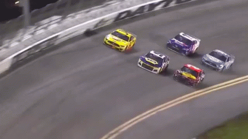 Race Cars Racing Down Track