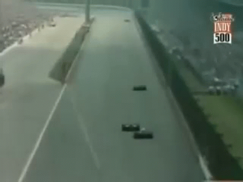 Race Cars Racing On Indy 500 Track GIF