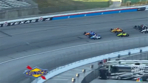 Race Track With Sunoco Sign GIF